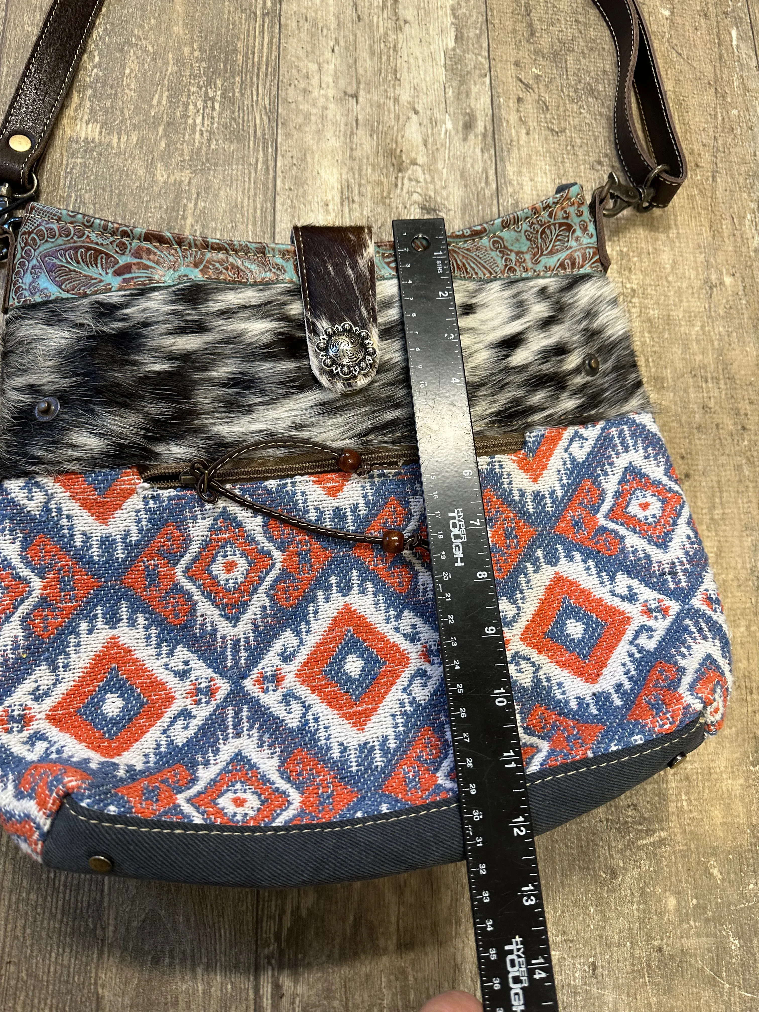 Cowhide, Tapestry and leather shoulder bag with leather strap