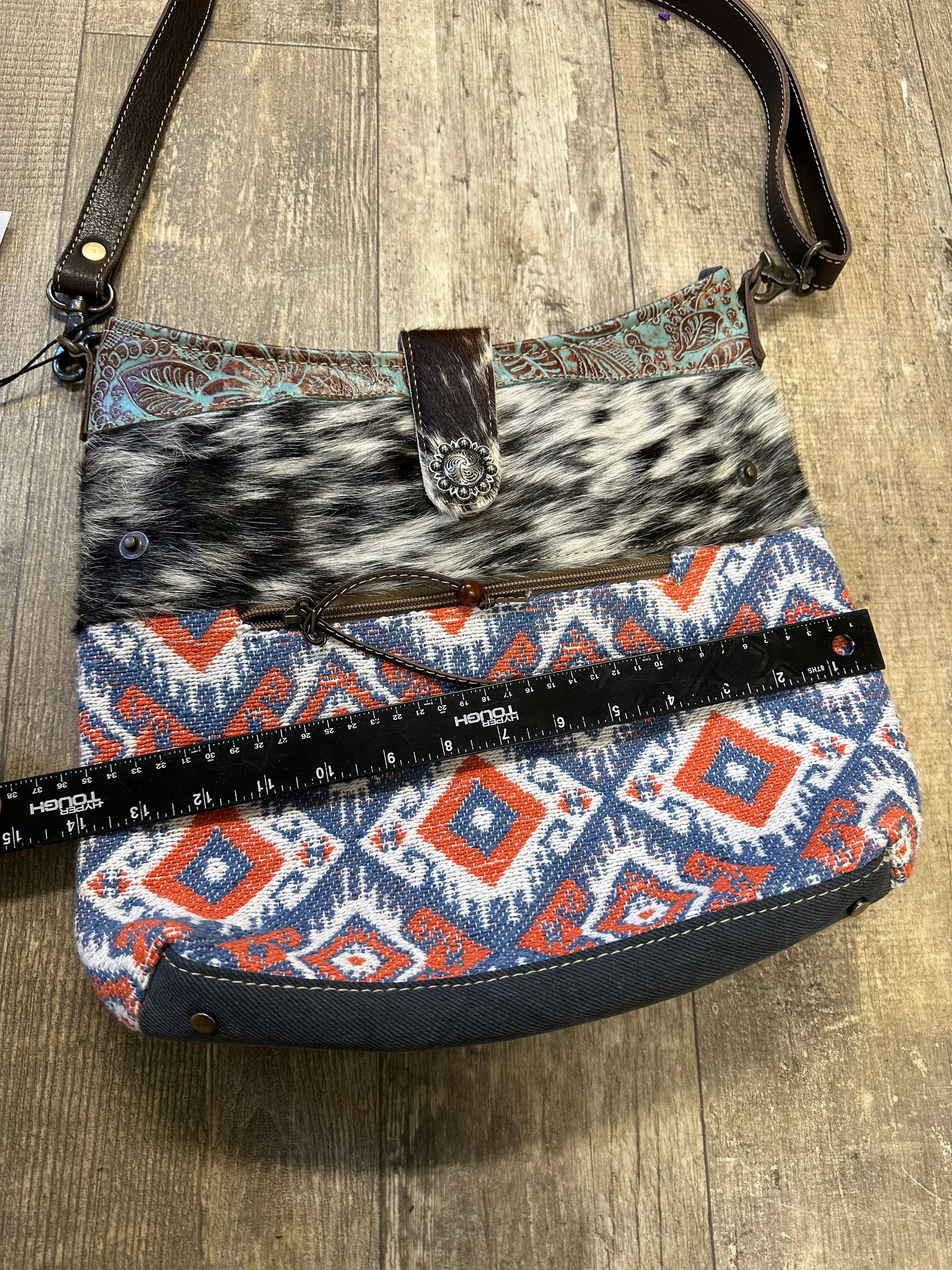 Cowhide, Tapestry and leather shoulder bag with leather strap
